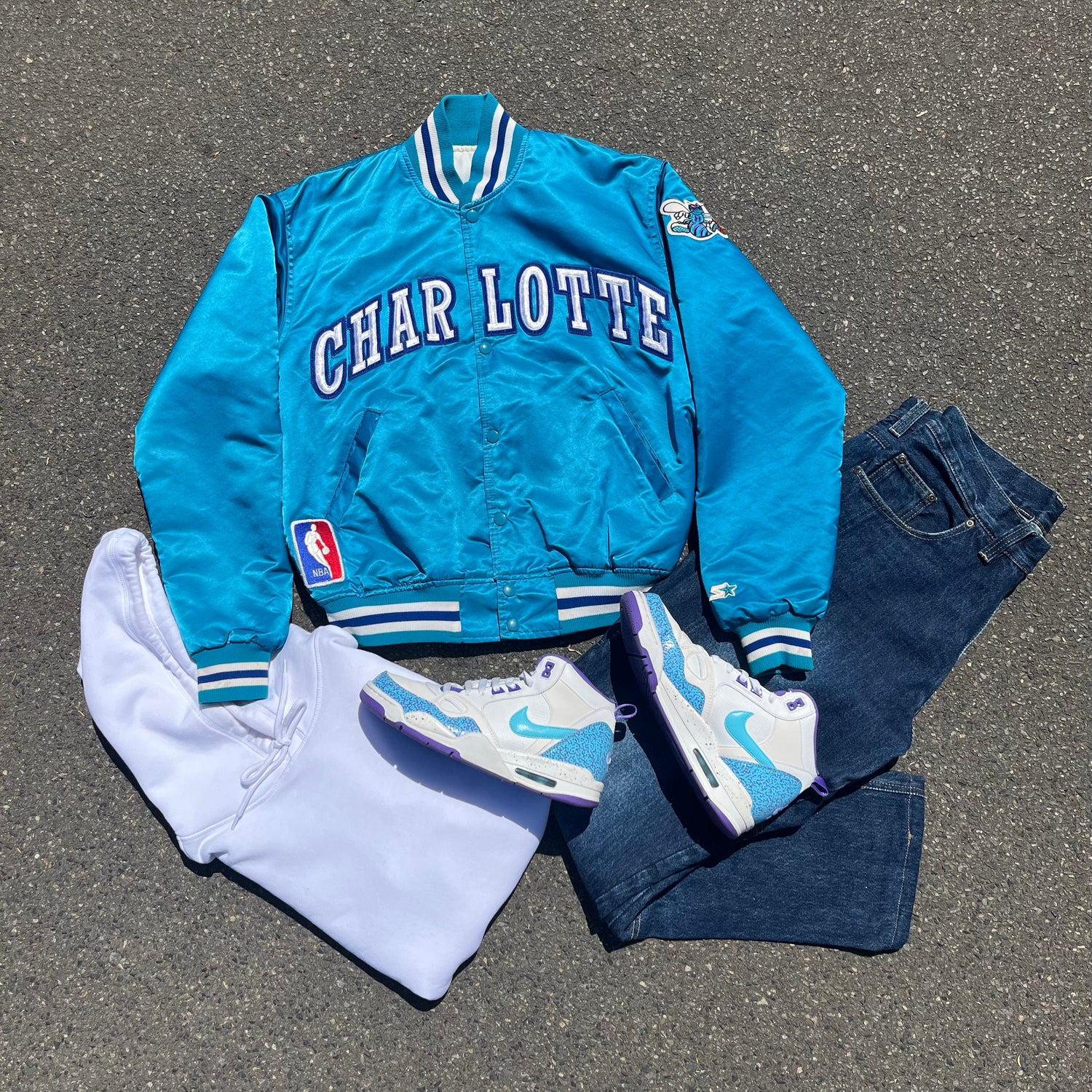 Charlotte hornets starter jacket online jimmy jazz